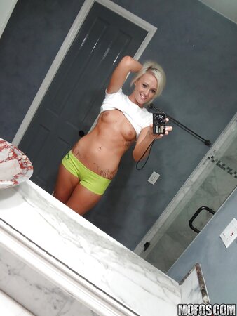 Towheaded colleen slips her panties whilst posing and taking selfies