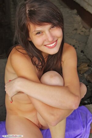 Outdoors photoshoot with a shameless totally naked girl