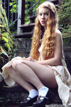 Blonde angelic nymph gets rid of her clothes once she's outdoors