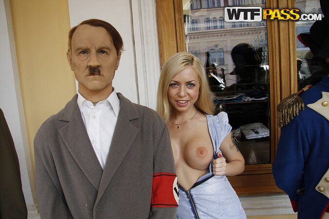 Isabella Clark poses with Hitler before fucking a hard cock