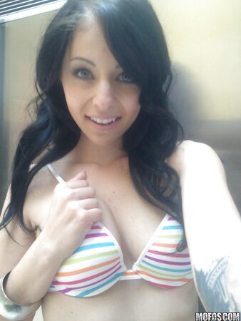 Attractive brunette takes provocative nude selfies specially for her man