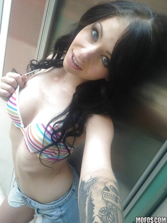 Attractive brunette takes provocative nude selfies specially for her man