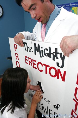 Brunette student gags on teacher's manhood through improvised gloryhole