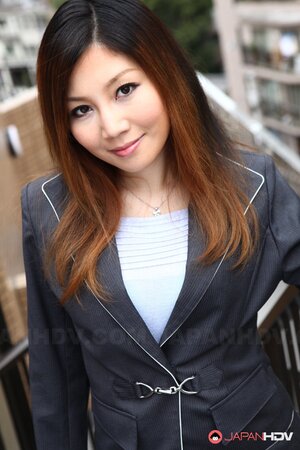 Asian female Yuria Kanno with red hair got excited and went out in sexy clothes