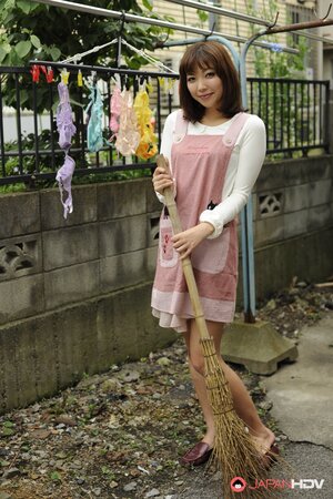 Horny Eastern young woman tired of household chores and trades it for masturbation
