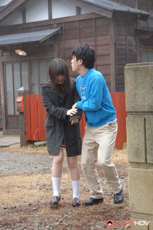 Japanese female takes shy young man behind the bar to give him a blowjob