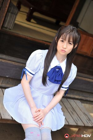 Adorable cutie from Japan performs amazing solo strip show on terrace