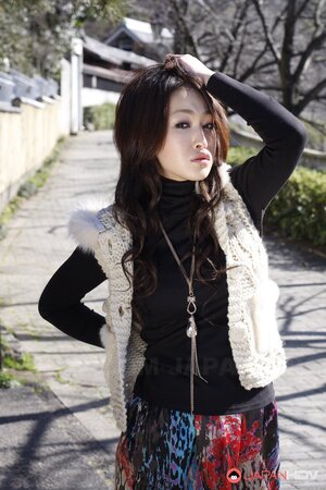 Super-cute Japanese love goes shopping and poses on camera in parallel
