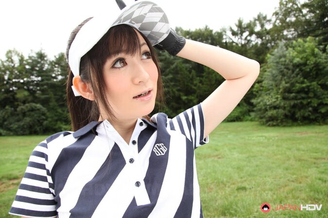 Asian cutie combines playing golf with flashing her panties hidden under skirt