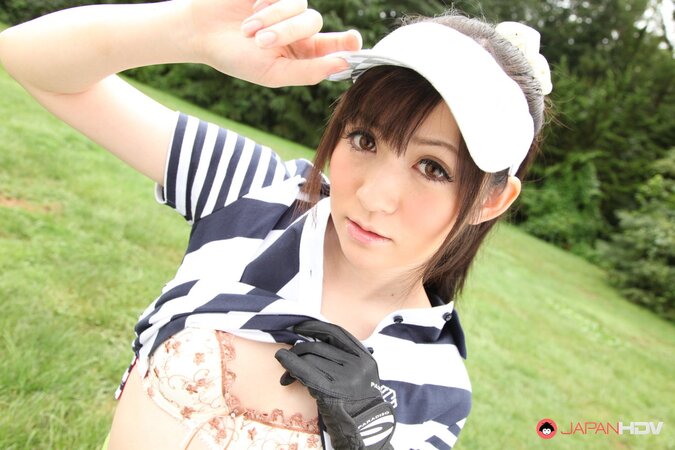 Asian cutie combines playing golf with flashing her panties hidden under skirt