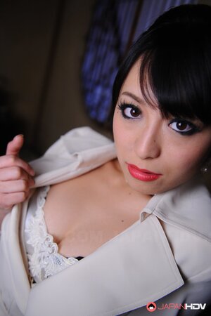 Captivating model from Japan teases cameraman with her seductive cutout