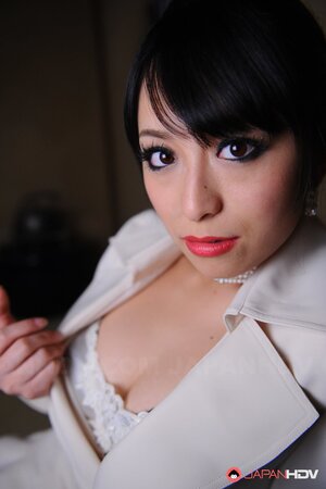 Captivating model from Japan teases cameraman with her seductive cutout