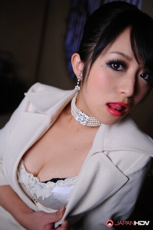 Captivating model from Japan teases cameraman with her seductive cutout