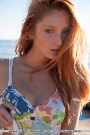 Hot redhead flaunting her big tits and her fuckable pussy