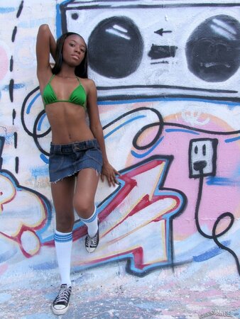 Petite ebony fetish girl displays her sweet small tits and awesome tiny ass