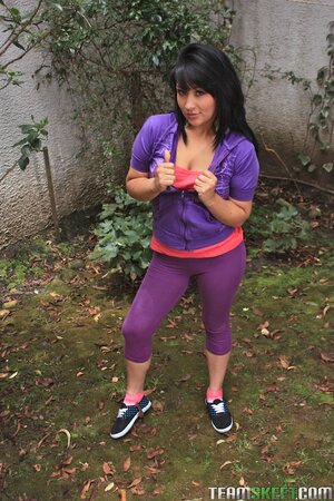Sporty Hispanic girl showing off her round ass and natural tits