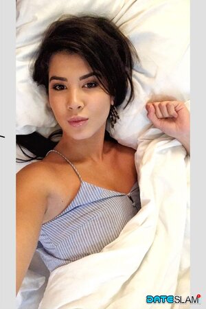 Dee snaps selfies in her everyday clothes and then in sexy lingerie