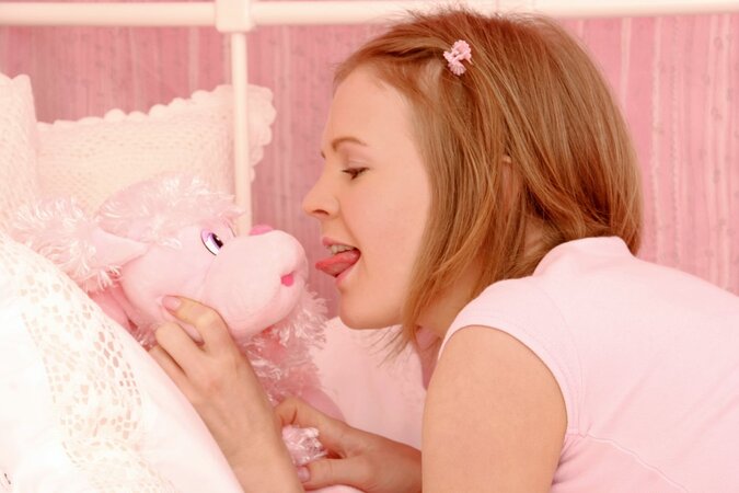 Cute girl is making out with a plushie and fucking he holes