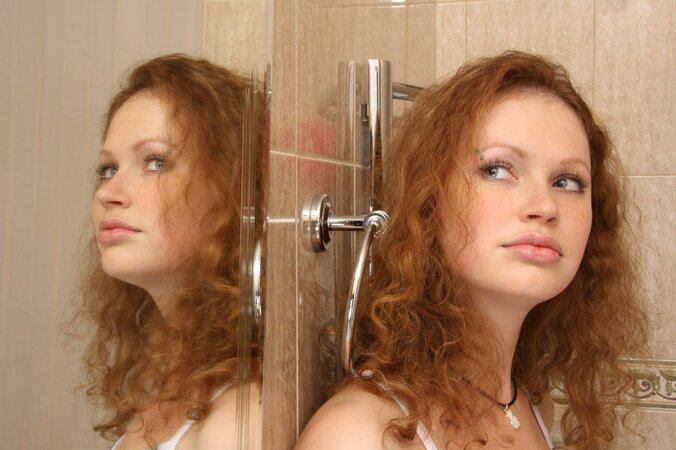 Frizzy-haired girl wants to show those panties and tease