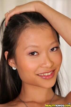 Asian babe presents rare combination of petite body and big round tits