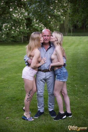 Threesome porn pictures of a chick with tattoo on leg and winsome friend