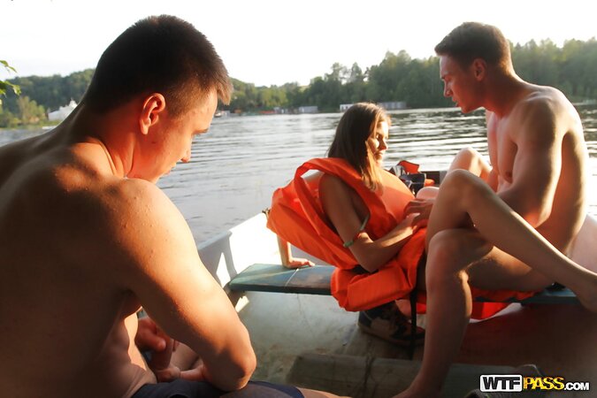 Guys shake the boat while fucking slutty girl from St. Petersburg together