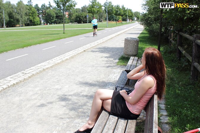 Amateur redhead chick agrees to show her tits on camera in the public place