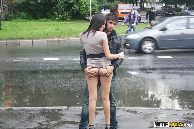 Russian slut flashes tits and lets guy touch her ass in the public place