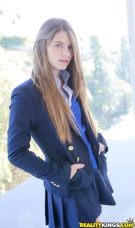 Enticing schoolgirl with sexy long hair Alice March flaunts her beautiful body