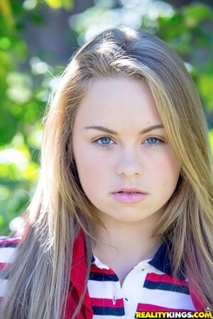 Student chick Madison Chandler playfully shows off tits, pussy, and butt outside