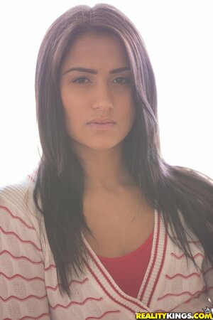 Good-tempered beauty with black hair loves to show her shaved snatch