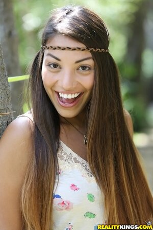 Hippie girl with tanned body is sure that nudity will save the world