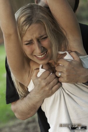 Poor blonde punished in backyard by guy who loves to use whip and wax