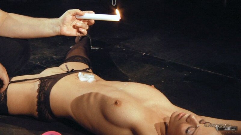 Blonde girl in stockings sucks master's dick after he pours body with hot wax