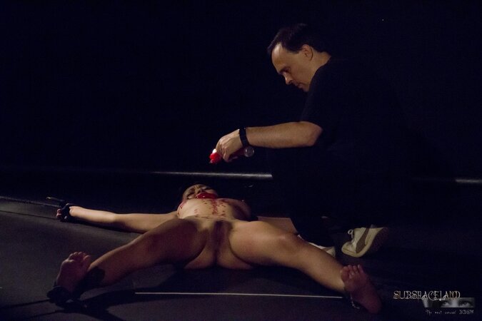 Adorable girl from Japan tied up by man who pours wax on her slim body