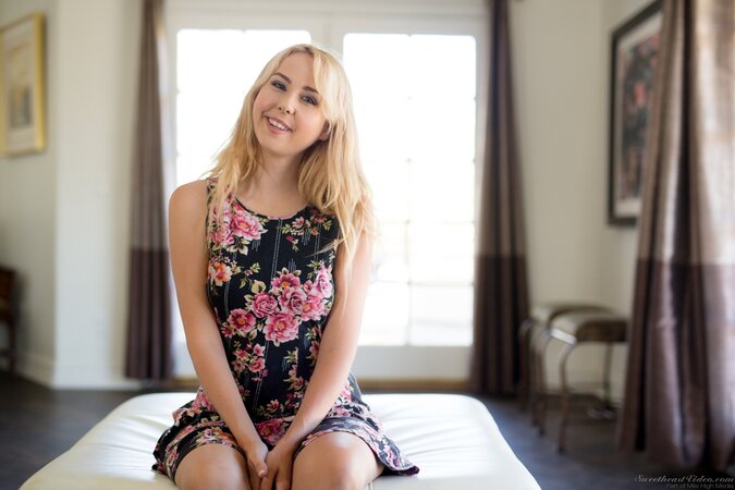 Innocent blonde unhurriedly reveals slim body hidden under modest dress