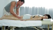 A tight body is getting taken care off on the massage table