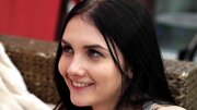 A bitch with black hair is riding a cock and she is giggling too