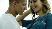 Two hot bitches are in a threesome and they are licking a big cock