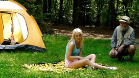 Blonde satisfied by old stranger during picnic in forest