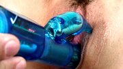 Bloke is using lots of different sex toys on her burning pussy
