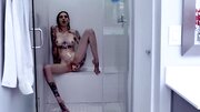 Inked babe combined hands and dildo for double portion of orgasm