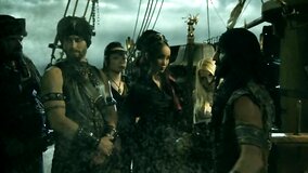 Two stunning babes are banging captain of the pirate ship