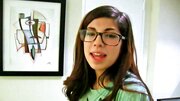 Ava Taylor wears her glasses while she plays with a cock