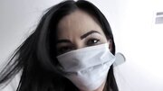 Dark-haired girl wears mask and gloves during sex with stepbro