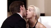 Enticing blonde tempts lover into spontaneous lovemaking on the table