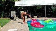 Missy Maze is lounging naked in the pool in this video