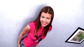 Foxy girl talks dirty while fingering her butt on the couch