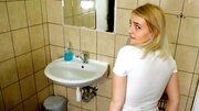 Cute blonde is fucked in the toilet next to a cuckold boyfriend