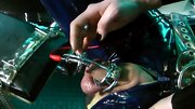 Kinky mistress dominates her slave in latex BDSM scene